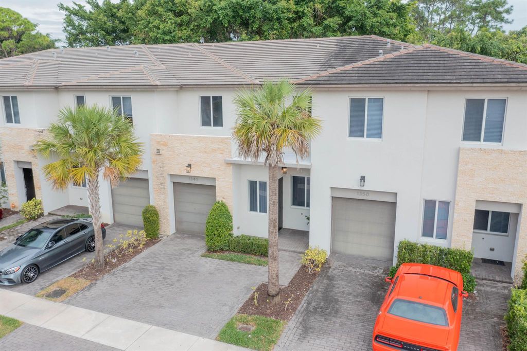 Photo of 1340 Pioneer Way, Royal Palm Beach, FL 33411 (MLS # R11039931)