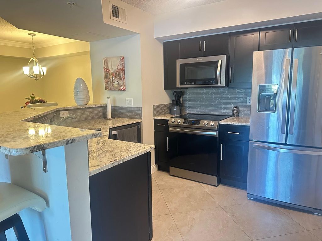 Photo of 3756 NW Mediterranean Lane #210, Jensen Beach, FL 34957 (MLS # F10493532)