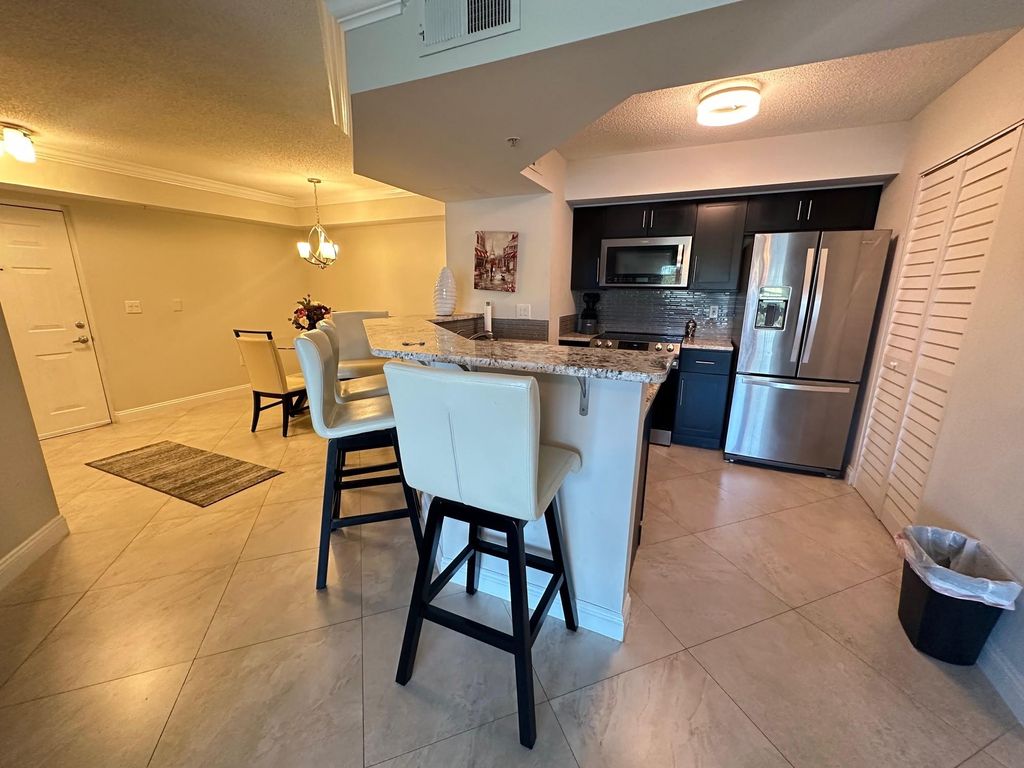 Photo of 3756 NW Mediterranean Lane #210, Jensen Beach, FL 34957 (MLS # F10493532)
