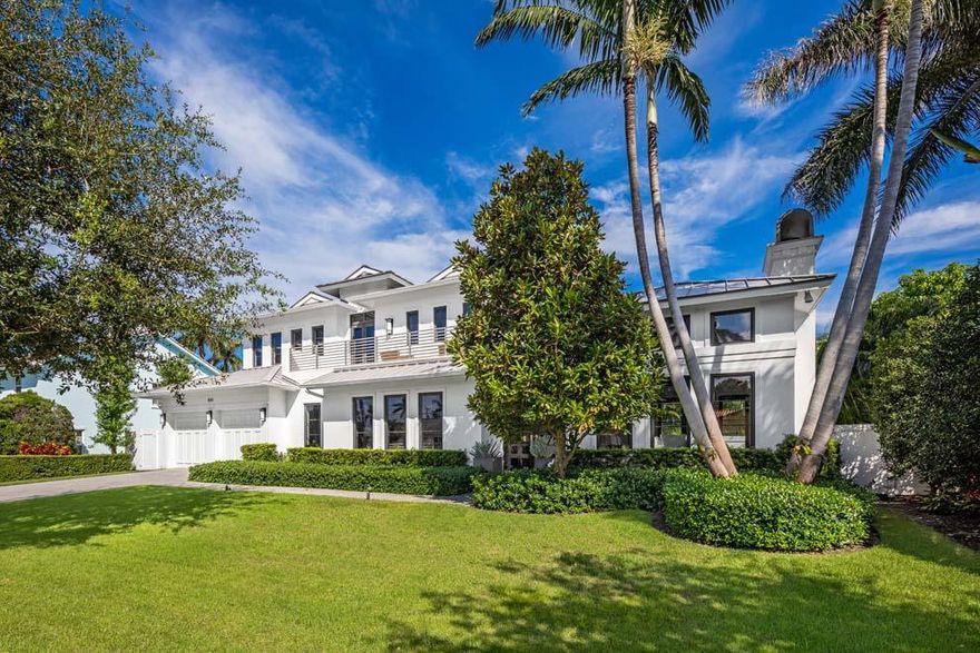 This custom built home combines a classic elegance with modern sophistication to offer the absolute best in South Florida luxury living. Nestled in the desirable Seagate Neighborhood, the home is just blocks from the ocean and the shops and eateries of Atlantic Avenue. Boasting over 5,700 total square feet, the coastal residence has a floor plan that is perfect for both festive entertaining and private retreats with five bedrooms; gourmet kitchen; wine cellar; master suite; high-end finishes; marble and hardwood floors; two laundry rooms; and impact glass. The pool and poolside terraces offer a tranquil oasis with covered loggia; summer kitchen; and lots of room for outdoor dining and lounging. This sensational beach area property is perfect for year-round living or seasonal getaways. FEATURES:
" 5 bedrooms / 5.1 baths
" 4,902 square feet under air / 5,710 total square feet
" Built in 2011 by renowned builder Vintage Building and Design
" Exceptional location near Atlantic Ocean and Atlantic Ave
" Decorative drive and walkway with expansive front yard create a lovely curb appeal
" Front portico with double glass door entry leads to foyer with views of the pool and grounds
" Natural light throughout; wood, limestone, and marble floors; custom finishes; and high-end upgrades
" Formal living room with fireplace and French door access to pool and back grounds
" Hallway leads to stairway and main living areas including media room; powder room; and a bonus room that can be used as an office or gym
" Formal dining room with wine cellar and kitchen nearby
" Spacious kitchen opens to the family and features top-of-the-line appliances; large casual dining area; island with snack bar seating; and access to covered loggia and summer kitchen
" Family room overlooks the pool with access to terrace and grounds
" Hallway off family room leads to full bath, access to north yard and guest bedroom with walk-in closet
" Service hallway leads to pantry, laundry room, storage area, office and garage
" Sleek stairway has custom railings and leads to large landing with sitting area and balcony
" Private master wing offers volume ceilings; balcony; two walk-in closets; dual vanities; soaking tub and custom glass shower; and linen closet
" Other second floor features include three additional en suite guest bedrooms; large laundry room; and business center type desk
" Tranquil salt-water pool with expansive terrace for outdoor lounging and dining; covered loggia; and summer kitchen with built-in grill
" Abundant privacy with walled backyard; fence with gates; manicured landscape with turf north yard; and expansive front grounds
" Two car garage with epoxy floors; 20kw generator; natural gas; security system; standing seam metal roof; and impact glass windows and doors

Tucked away in the south end of the Seagate Neighborhood, this beach area estate offers privacy and plenty of room for residents and guests alike. Enjoy the close proximity to the beach, Atlantic Ave, Palm Beach, Boca Raton, and all points of interest. Come discover what Luxury Living is all about.