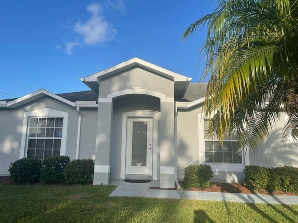 Photo of 1480 SE Barker Lane, Port St Lucie, FL 34983 (MLS # R10875190)