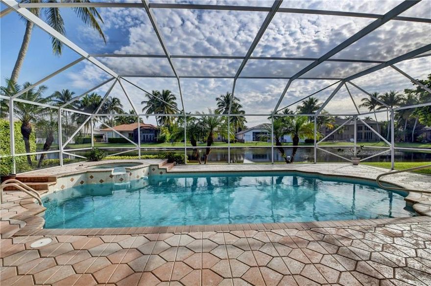 A MUST SEE! Spectacular LARGE LAKE FRONT CUL DE SAC LOT! Upon entering you will be greeted with floor to ceiling windows with a wonderful view of the oversized screened pool area and beautiful lake. VERY BRIGHT AND LIGHT, oversized COVERED PATIO like, great for entertaining with full cabana bathroom. EATING IN Kitchen with granite counters, large island, stainless steel appliances.  Main suite with separate office space/sitting area, pool and lake views, customized walk in closets and large bathroom. 24 hour manned gated community, olympic size pool, spa, fitness center, tennis courts, play area and club house. Close prox. to Burt Aaronson S. County Park. A rated schools. All meassu. are approx. based on tax roll inf. OPEN HOUSE FRIDAY/SAT./ SUNDAY - 1pm to 4pm - MUST SCHEDULE TO ATTEND. HOA APPLICATION $200