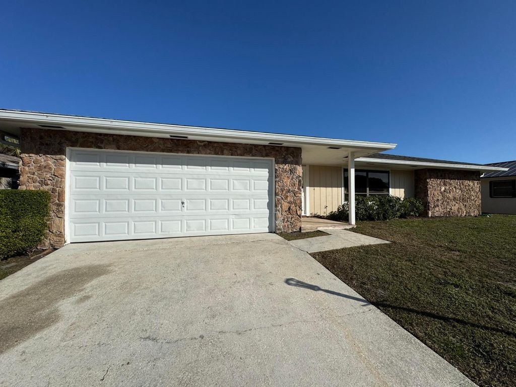 Photo of 2514 Canterbury Drive N, Riviera Beach, FL 33407 (MLS # R11050938)
