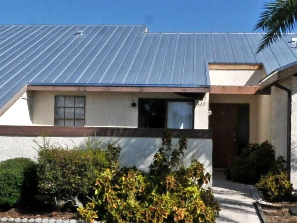 Photo of 465 SW Bill Traitel Avenue, Port Saint Lucie, FL 34953 (MLS # R10744596)