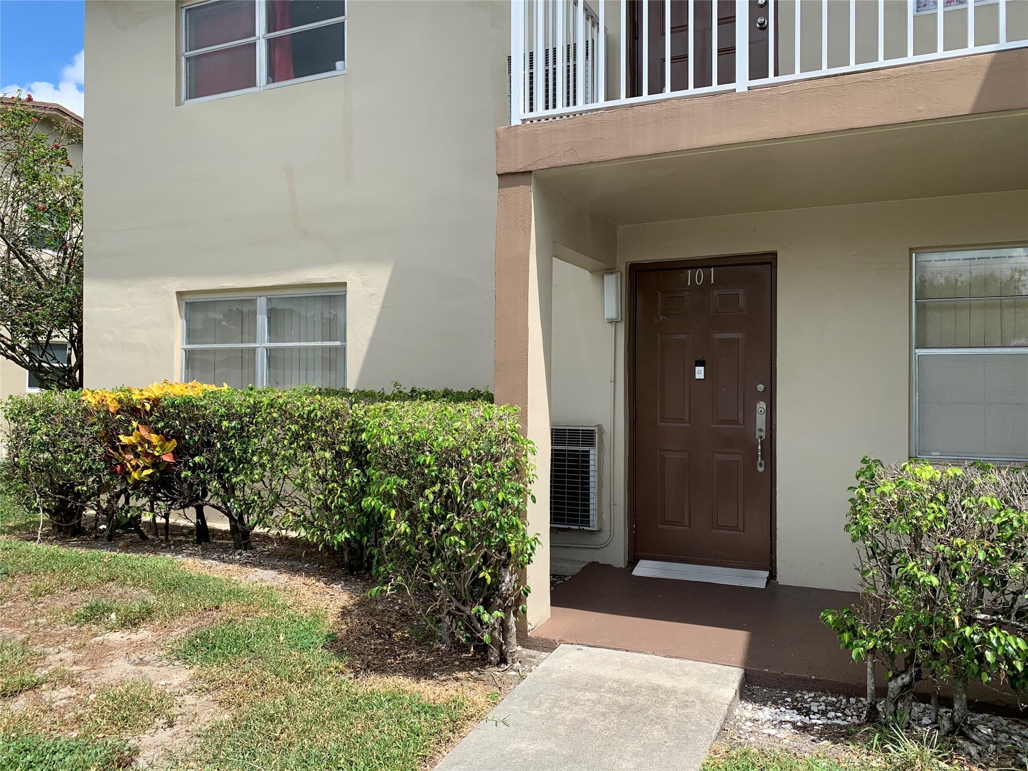 Rarely available ground floor corner unit with laminate floors throughout and convenient parking directly in front including a custom ramp leading to your private entry. Enjoy relaxing on your screened patio with easy access to the outdoors. Inside, this bright and cheerful home offers numerous updates and thoughtful features designed to enhance comfort and convenience, including bathroom modifications that support easier daily living. The layout is open and welcoming, with plenty of natural light throughout. This residence combines style and practicality in a highly desirable location. Community rules allow no pets; however, service and emotional support animals are welcome in accordance with the law. Great clubhouse with lots of amenities and activities.