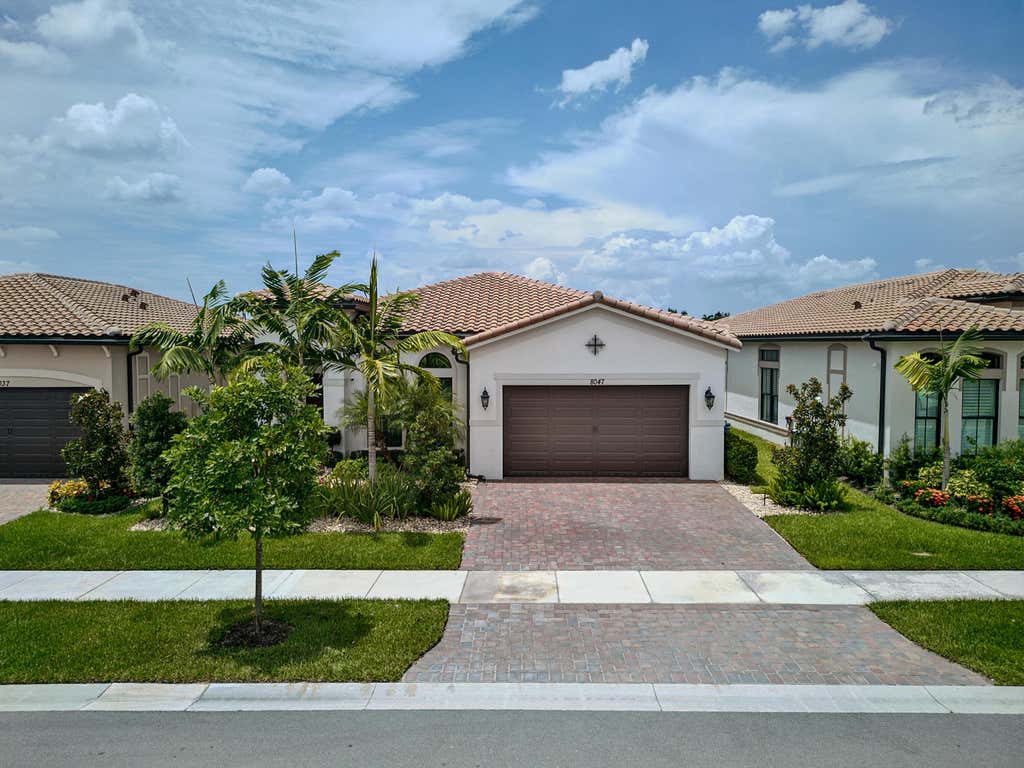 Photo of 8047 JUNIPER Drive, Parkland, FL 33067 (MLS # B26066202)