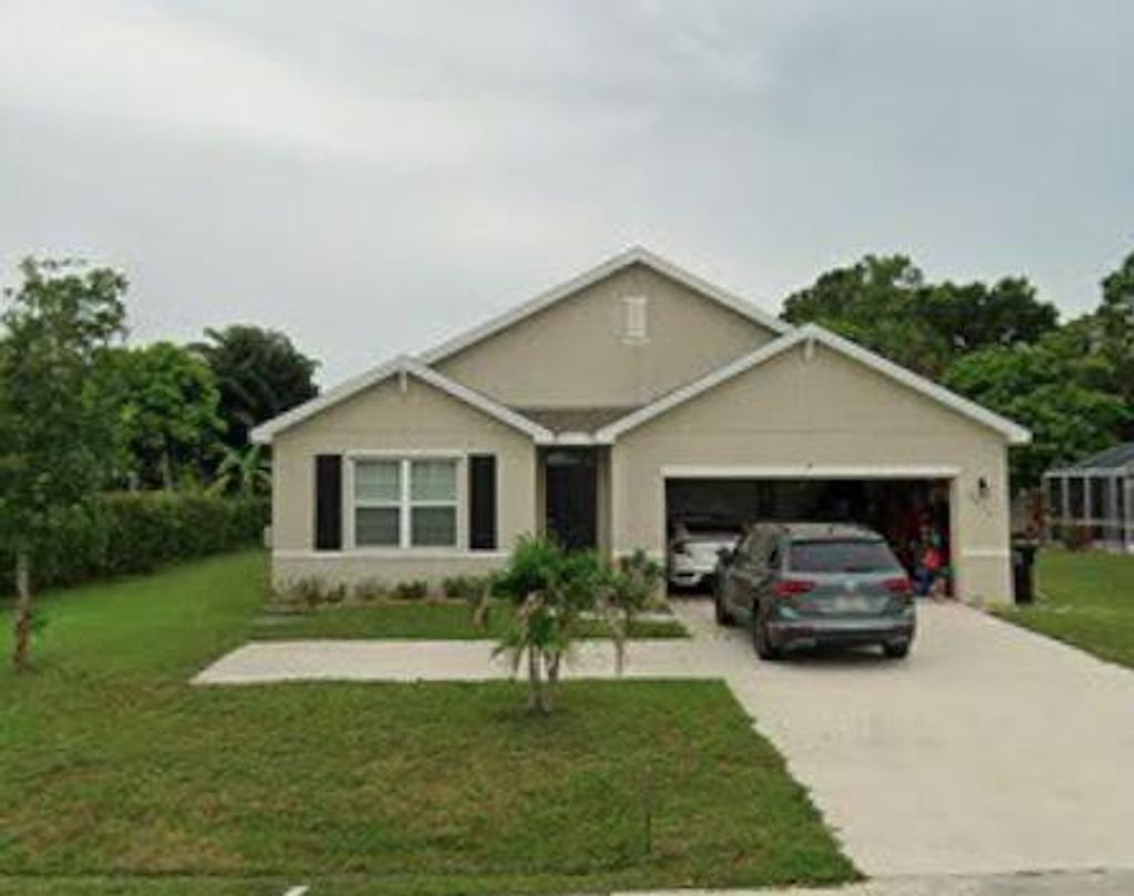 Photo of 5015 NW North Macedo Boulevard, Port Saint Lucie, FL 34983 (MLS # B26034997)