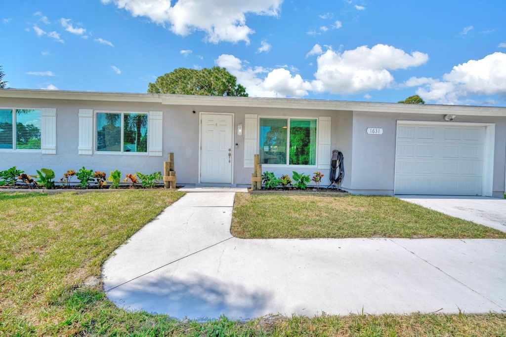 Photo of 1631 SE Minorca Avenue, Port Saint Lucie, FL 34952 (MLS # R10985743)
