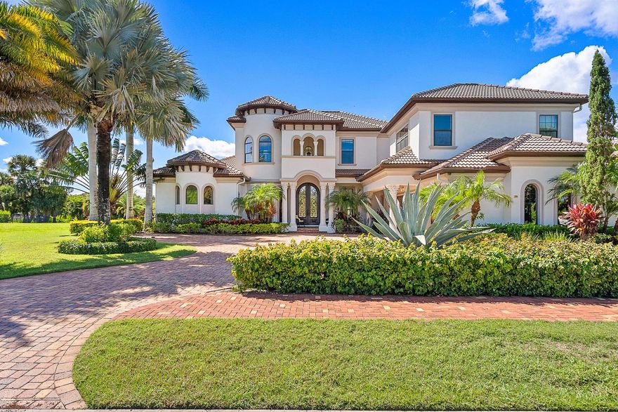 Discover true luxury in this stunning Arthur Rutenberg Estate home, built in 2014 with every detail thoughtfully designed. Featuring 6 bedrooms, 7 baths, over 6,000sq ft of AC living space, this residence seamlessly blends elegance and comfort. A separate off the pool deck-currently a gym-offers endless possibilities as a studio, in-law suite, or game room. The outdoor oasis includes an oversized pool and spa, a pavilion-style patio, and a fully equipped summer kitchen, perfect for entertaining. Enjoy tranquil views of the St. Lucie River's North Fork and a beautifully landscaped yard. The updated dock is suitable for a large yacht. Inside, formal & casual living areas surround a magnificent kitchen, while a home theater and an expansive master closet elevate the lifestyle. New 2025 Roof!