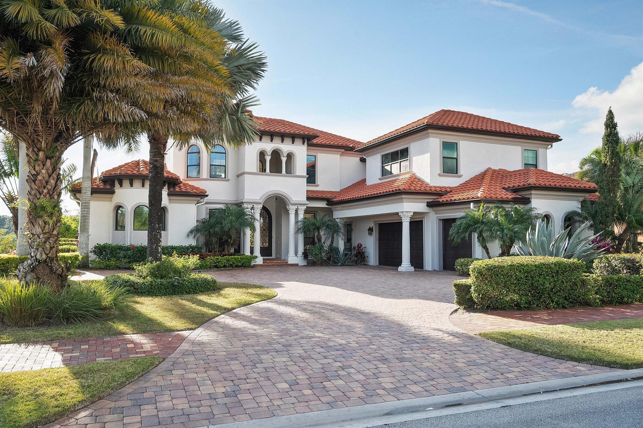 Discover true luxury in this stunning Arthur Rutenberg Estate home, built in 2014 with every detail thoughtfully designed. Featuring 6 bedrooms, 7 baths, over 6,000sq ft of air-conditioned living space, this residence seamlessly blends elegance and comfort. A separate off the pool deck-currently a gym-offers endless possibilities as a studio, in-law suite, or game room. The outdoor oasis includes an oversized pool and spa, a pavilion-style patio, and a fully equipped summer kitchen, perfect for entertaining. Enjoy tranquil views of the St. Lucie River's North Fork and a beautifully landscaped yard. The updated dock is suitable for a large yacht. Inside, formal and casual living areas surround a magnificent kitchen, while a home theater and an expansive master closet elevate the lifestyle.