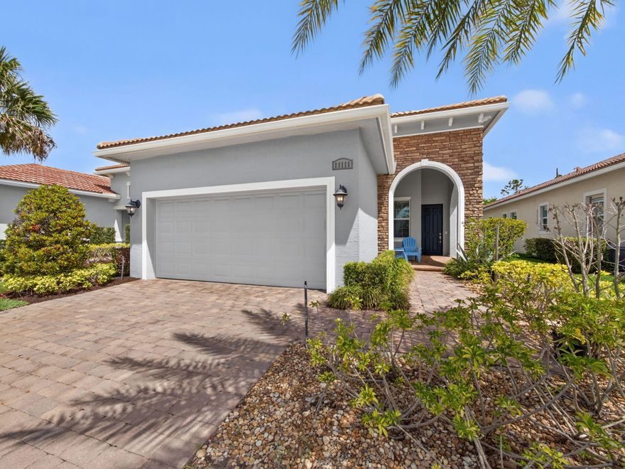 Beautifully upgraded 2BR + den/office, 2BA, 2CG single family home in the gated, active adult community of PGA Verano. Designer kitchen features SS appliances, upgraded pantry, large center island with granite, and abundant cabinetry! Flexible den offers custom built-in desk and Murphy bed—easily functions as a 3rd bedroom. Tile & LVP flooring throughout. Upgrades include impact glass, 4 ceiling fans, Halo air purification system, custom closet built-ins, epoxy garage flooring, & an oversized screened covered lanai with private yard! Lakefront views from front porch & gorgeous sunsets. PGA Verano offers resort-style living with pickleball, tennis, several pools, clubhouse, fitness center, social activities galore, and optional PGA golf access. Gated. Exceptional lifestyle!