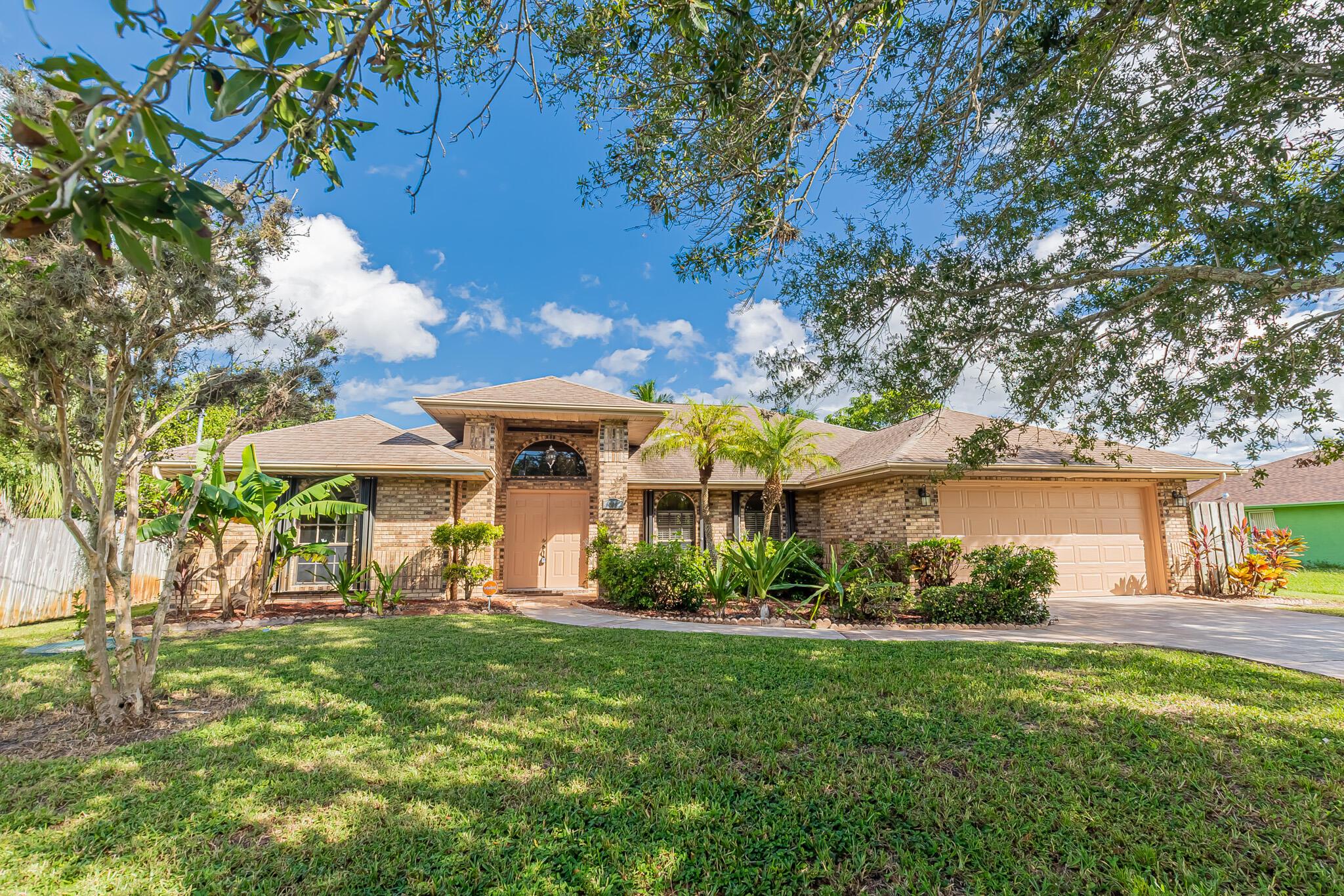 RARE FIND! READY FOR IMMEDIATE OCCUPANCY! NO HOA! Charming private pool home with gorgeous canal views offers 3 Bedroom , 2.5 Bath, over sized 2 car garage with new luxury vinyl floors in all bedrooms, tile through all other areas , stainless steel appliances, washer & dryer included, partially renovated bathrooms & fruit trees. Rent includes pool care, lawn care and pest control. Home is also on public water & sewer. Call today for your private tour!