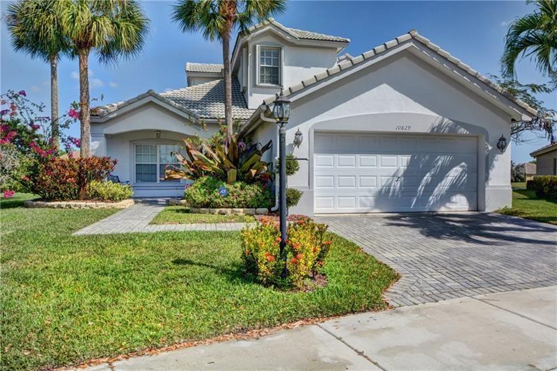 Waterfront Pool Home located on an oversized Cul-De-Sac lot in the sought-after Parkland Isles Community. Master Bedroom and one guest Bedroom downstairs. A huge loft on the 2nd floor can convert to a 5th Bedroom or Office. The spacious Kitchen has granite countertops and stainless steel appliances. Screened Patio overlooking a wide lake view. One of the lowest HOA Fees in Parkland for a Community full of Amenities including a Tennis Court, Heated Pool and Spa, Gym, Basketball Court, and all A+ rated Schools. Walking distance to all Schools and minutes from everything. This is a must-see. Seller will credit up to $40000 to buyer at the closing as closing cost.