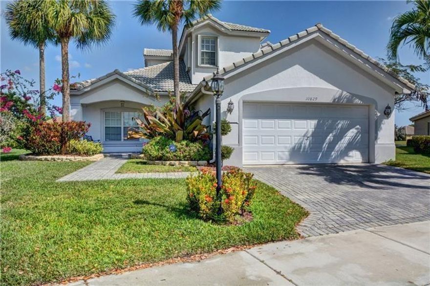 Waterfront Pool Home located on an oversized Cul-De-Sac lot in the sought-after Parkland Isles Community. Master Bedroom and one guest Bedroom downstairs. A huge loft on the 2nd floor can convert to a 5th Bedroom or Office. The spacious Kitchen has granite countertops and stainless steel appliances. Screened Patio overlooking a wide lake view. One of the lowest HOA Fees in Parkland for a Community full of Amenities including a Tennis Court, Heated Pool and Spa, Gym, Basketball Court, and all A+ rated Schools. Walking distance to all Schools and minutes from everything. This is a must-see. Seller will credit up to $40000 to buyer at the closing as closing cost.