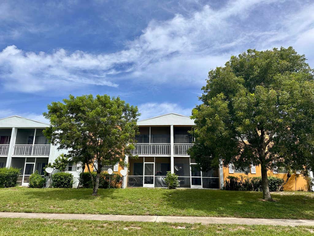 Photo of 1505 CRESCENT Circle #A12, Lake Park, FL 33403 (MLS # B26052804)