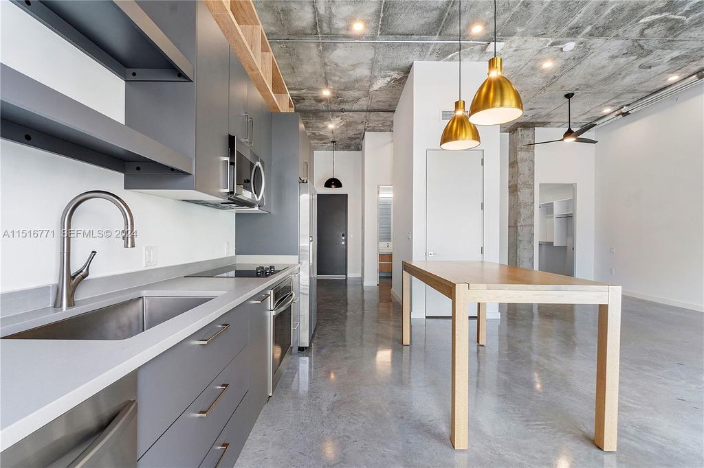 Photo of 401 NW 1st Avenue #303, Fort Lauderdale, FL 33301 (MLS # B26013345)