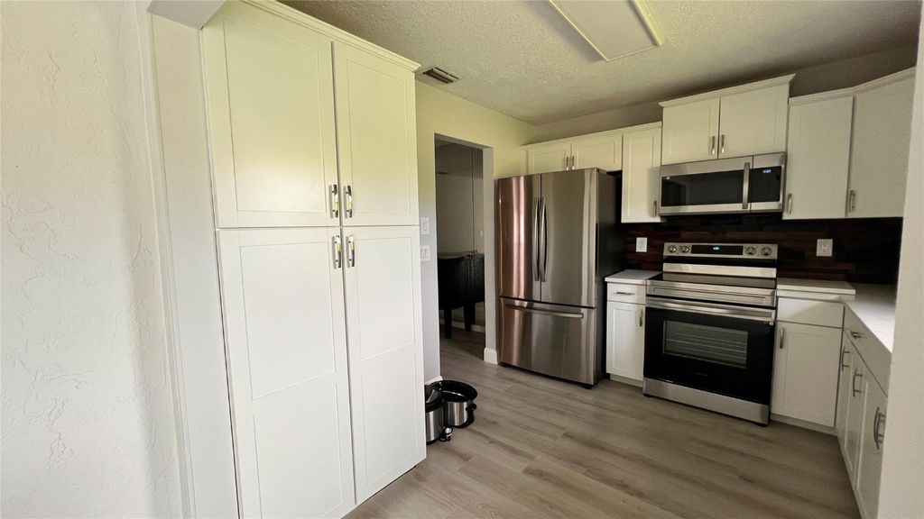 Photo of 3150 SW Sunset Trace Circle, Palm City, FL 34990 (MLS # F10407359)