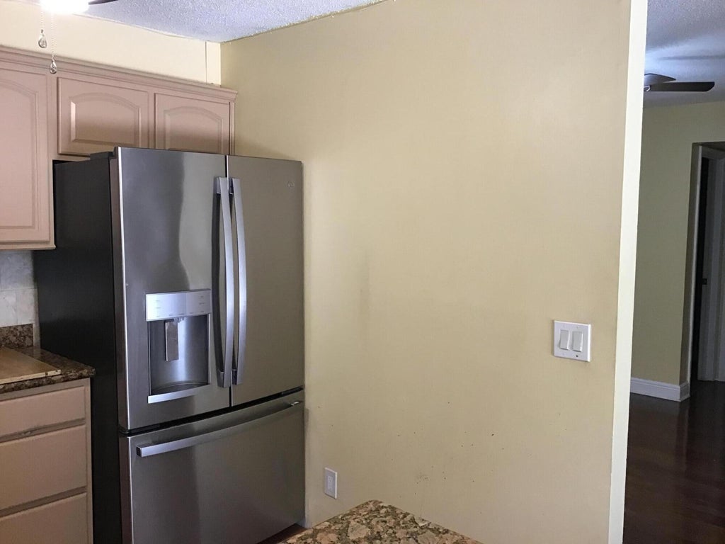 Photo of 1600 FOREST LAKES Circle #A, West Palm Beach, FL 33406 (MLS # B26071926)