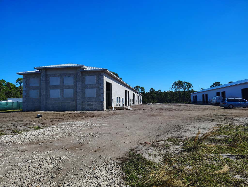 Photo of 2095 COMMERCE LAKES Drive #1-18, Port Saint Lucie, FL 34986 (MLS # B26052304)