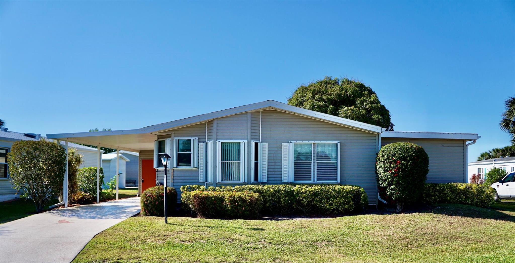 LAND OWNED!!! Don't pay a land lease when you can own this spacious home AND own your land! HUGE PRICE DROP & NEW ROOF CREDIT AT CLOSING! Welcome to Retirement Paradise. This 2 bed/2 bath home has a large Florida room which has been converted into a third bedroom, or could continue to be used as a Florida room. The open concept allows for easy entertaining of friends and family. Large 11x6 shed for pool floats and tools.Savanna Club is a premier 55+ resort-style community, offering residents an unparalleled array of amenities.The community features three beautiful clubhouses, a pristine 18-hole USGA golf course, a full-size theater, an on-site restaurant, a ballroom, tennis & pickleball courts, multiple swimming pools, fitness centers, and a library.