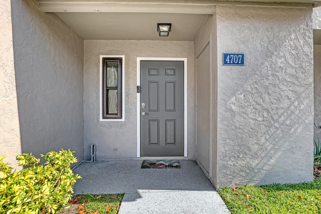 Photo of 4707 Pier Drive, Greenacres, FL 33463 (MLS # B26019652)