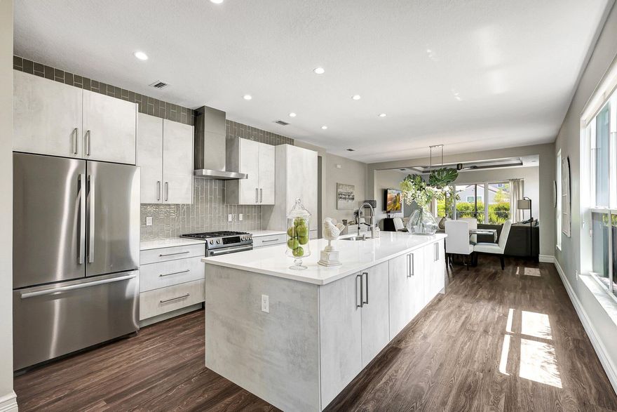 MOTIVATED SELLER, SUBMIT YOUR OFFER! Experience resort-style living in this luxurious 55+ community of Vitalia. This 2+ /bed, 2-bath home features a den with a closet that can easily be converted into a 3rd bedroom. Amenities include a fabulous clubhouse with two swimming pools, tennis courts, pickleball courts, bocce, and a putting green. This home was an original model home with meticulous upgrades, including Bosch stainless appliances, customized closets, an oversized quartz island with extra storage, custom shades, a private fenced yard, & impact glass windows, gas stove, and barbecue. The open floor plan offers seamless indoor/outdoor living, ideal for entertaining.