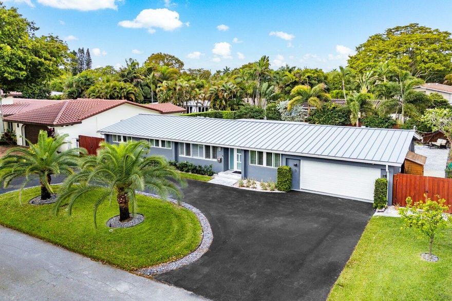 Coastal vibes & stylish living is what you'll come home to in this beautifully renovated pool home in the heart of Coral Ridge! Open concept living, dining, kitchen, & island allow for seamless flow & function. Wood tile floors in main, designer porcelain in bathrooms. This home is approx. 2300 sq ft under air, with 3 beds and 3 full baths, 2 car garage, & tons of storage. Outdoor living area is perfect for entertaining or relaxing with a fully enclosed privacy fence and self-closing gates. Covered patio has ceiling fans, ample seating area, & BBQ grill. Pool is salt chlorinated, heated, and has a sun shelf for lounging! Impact windows/doors throughout, A/C is 2023, roof is 2024. Property has security system, new electrical, sprinkler system.  Currently successful Air BNB.    Air BNB history available to investors.