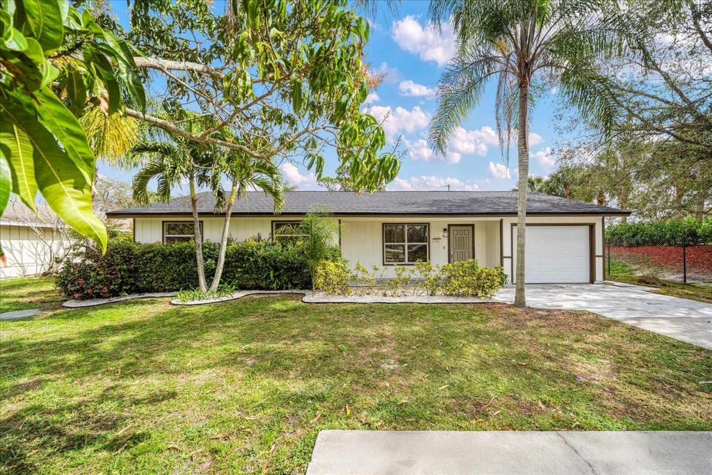 Photo of 1441 SE Sandia Drive, Port Saint Lucie, FL 34984 (MLS # R10958204)