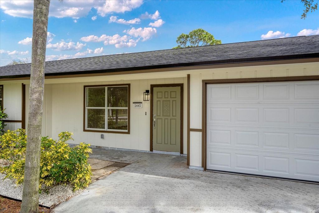 Photo of 1441 SE Sandia Drive, Port Saint Lucie, FL 34984 (MLS # R10958204)