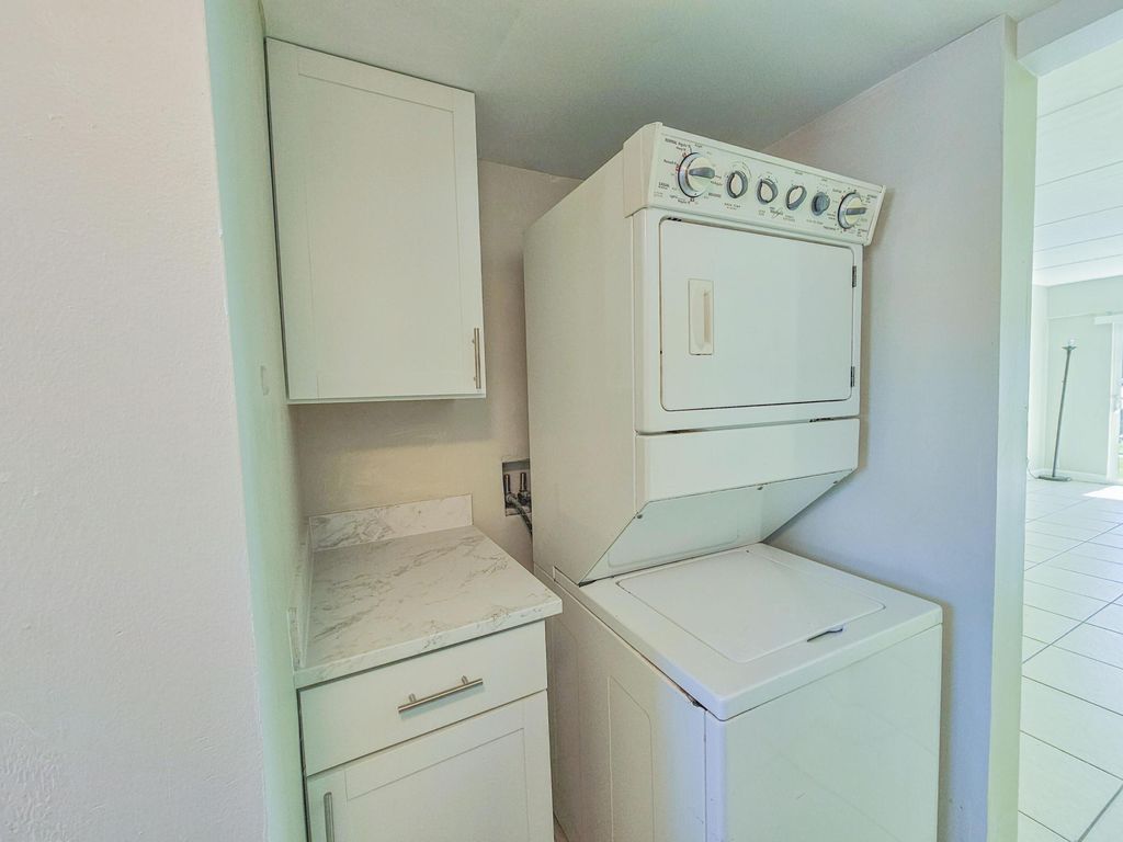 Photo of 1501 Crescent Circle #E40, Lake Park, FL 33403 (MLS # B26008665)
