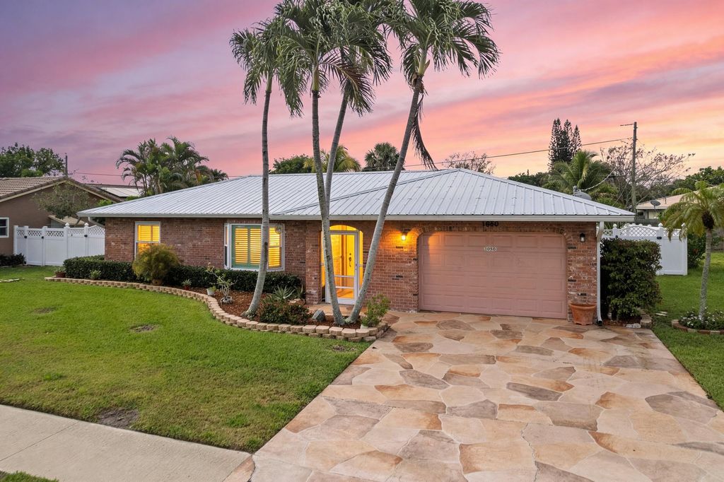 Photo of 1640 NW 10th Street, Boca Raton, FL 33486 (MLS # B26012928)