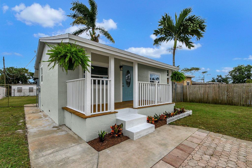 Photo of 1316 Rainbow Avenue, West Palm Beach, FL 33406 (MLS # R10949102)