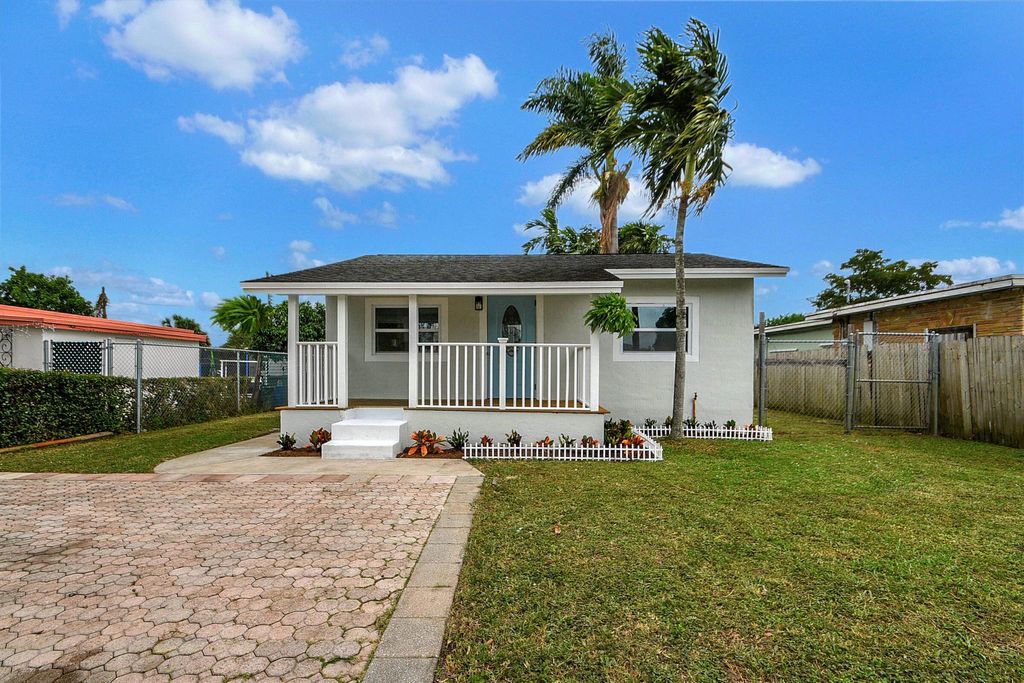 Photo of 1316 Rainbow Avenue, West Palm Beach, FL 33406 (MLS # R10949102)