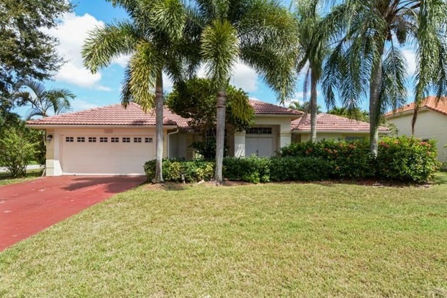 Lovely contemporary ranch home with lots of curb appeal in master planned community of Lake Charleston, offering 7 lakes stocked for fishing,  swimming pool, tennis, soccer fields and plenty of green space. Home features 4 bedrooms, 3 full baths and almost 2300 square feet with a formal dining room, volume ceilings, master bath with dual vanities and spa tub, granite counters and breakfast bar in open kitchen. Tile flooring and recessed lighting throughout with glass doors to covered patio from multiple rooms. Must see!