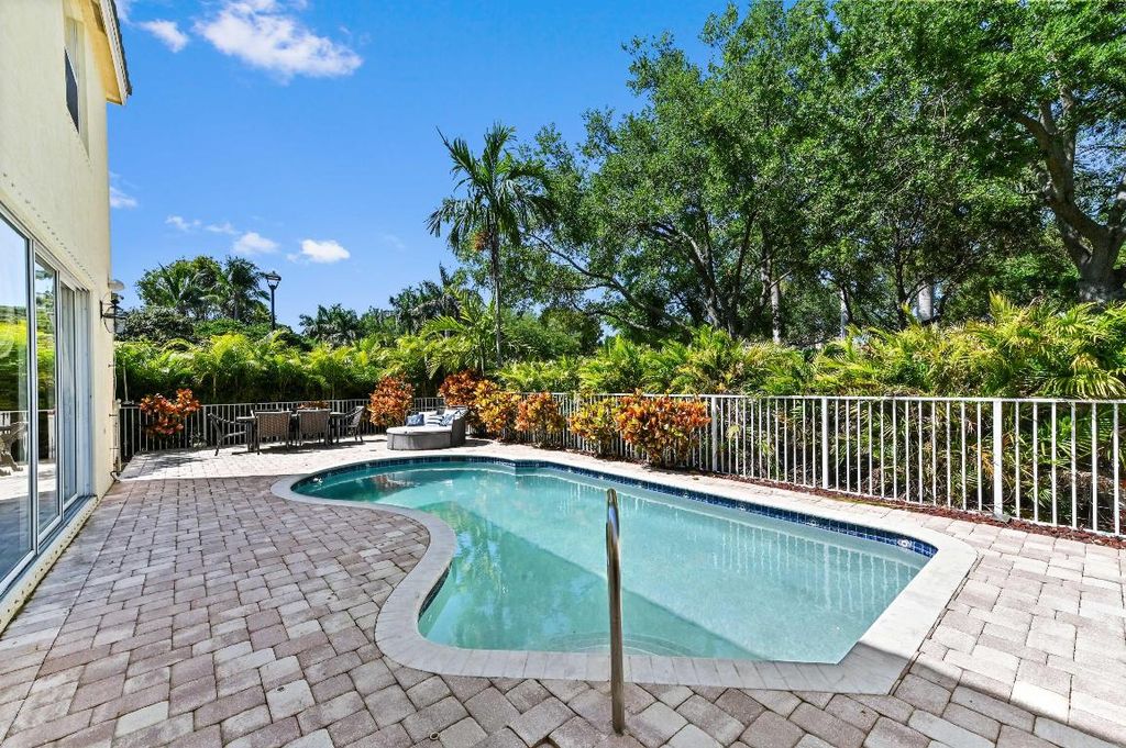 Photo of 135 Newberry Lane, Royal Palm Beach, FL 33414 (MLS # R11073784)