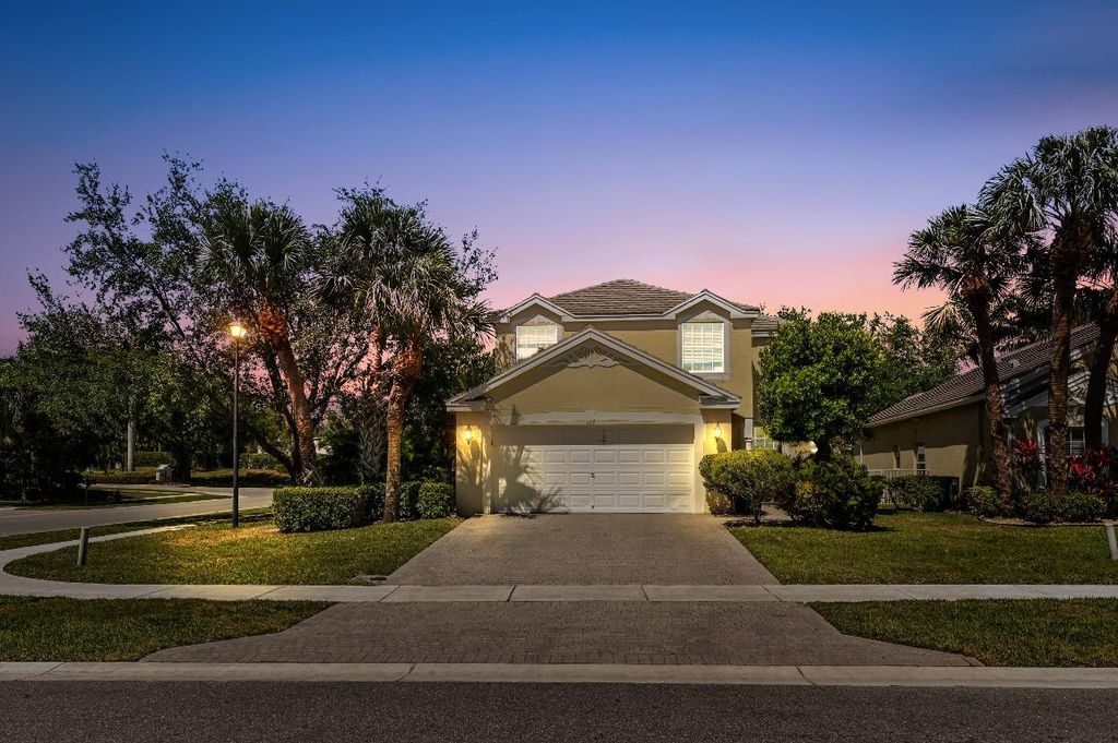 Photo of 135 Newberry Lane, Royal Palm Beach, FL 33414 (MLS # R11073784)