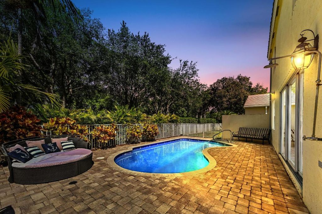 Photo of 135 Newberry Lane, Royal Palm Beach, FL 33414 (MLS # R11073784)