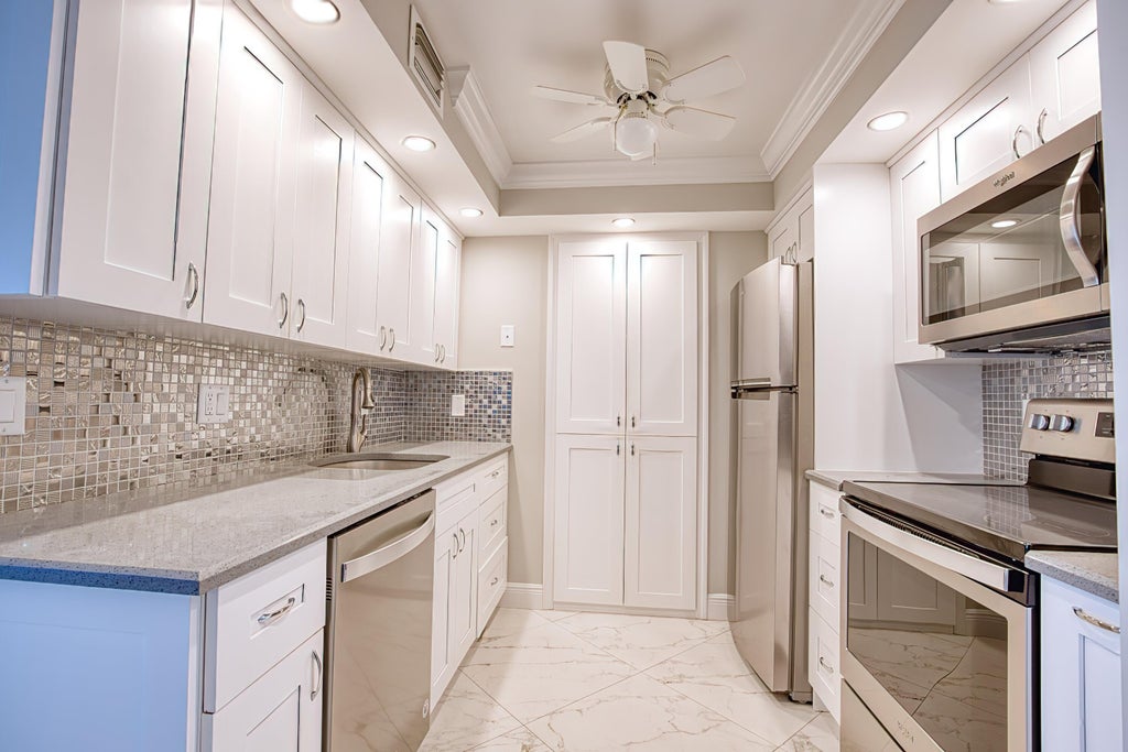 Photo of 111 Briny Avenue #610, Pompano Beach, FL 33062 (MLS # B26081937)