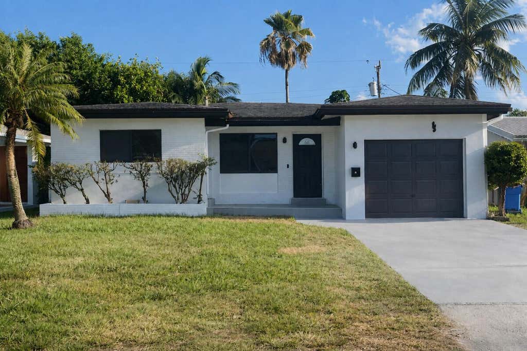 Photo of 80 NE 48TH Street, Oakland Park, FL 33334 (MLS # B26066450)