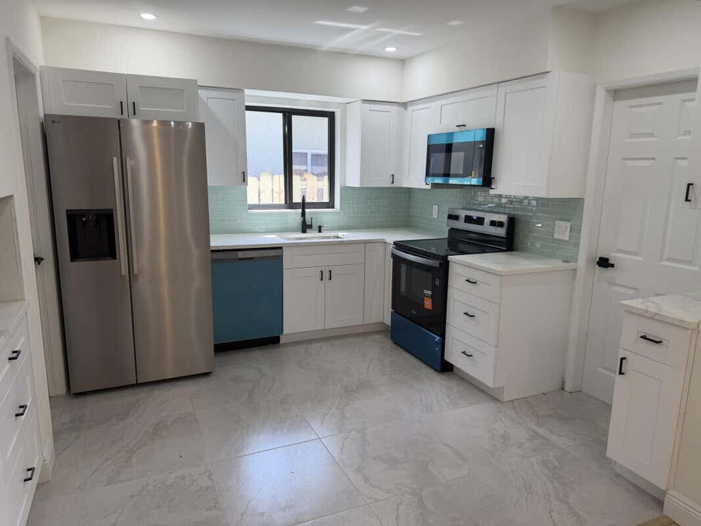 Photo of 80 NE 48TH Street, Oakland Park, FL 33334 (MLS # B26066450)
