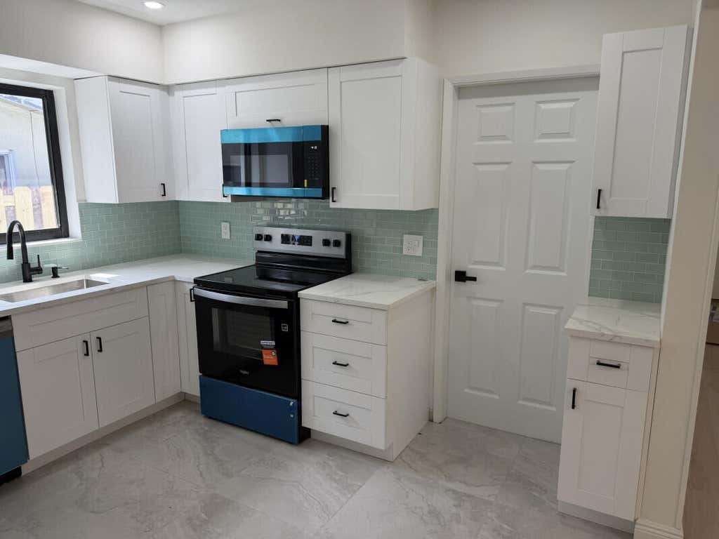 Photo of 80 NE 48TH Street, Oakland Park, FL 33334 (MLS # B26066450)