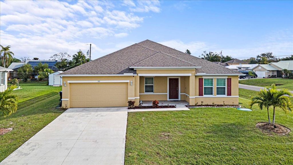 Photo of 701 NE Perch Lane, Port Saint Lucie, FL 34983 (MLS # R10953192)