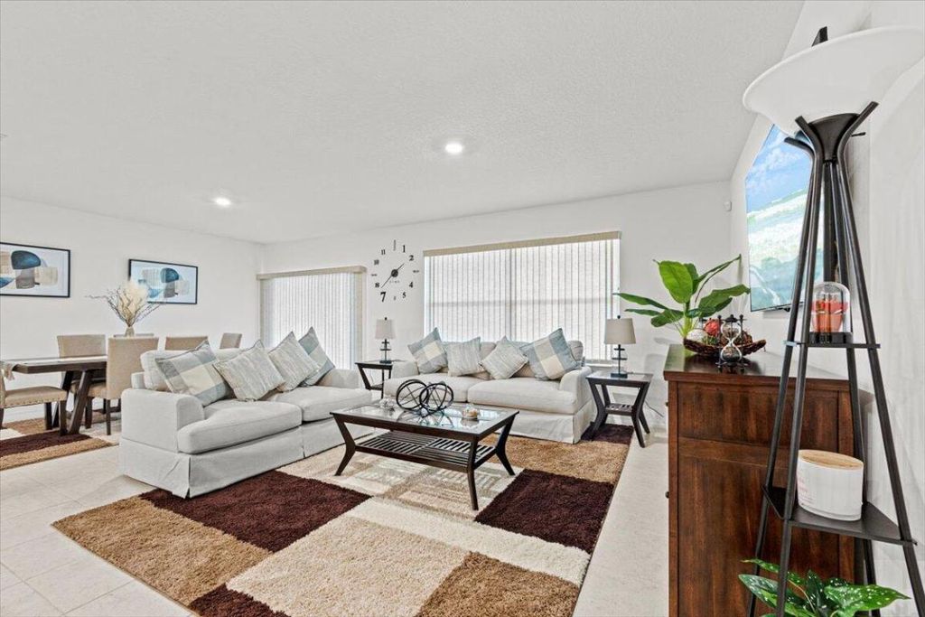 Photo of 701 NE Perch Lane, Port Saint Lucie, FL 34983 (MLS # R10953192)