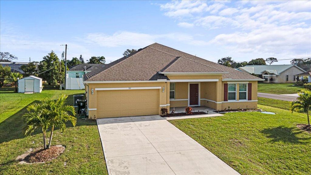 Photo of 701 NE Perch Lane, Port Saint Lucie, FL 34983 (MLS # R10953192)