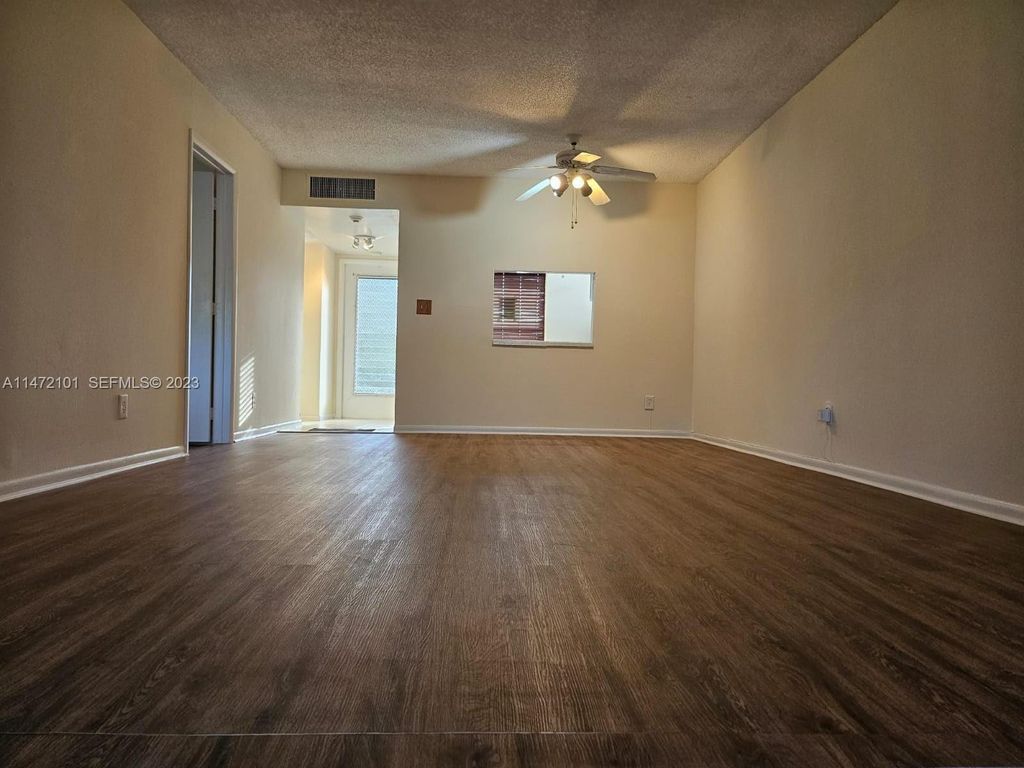 Photo of 5940 NW 64th Avenue #106, Tamarac, FL 33319 (MLS # B26002418)