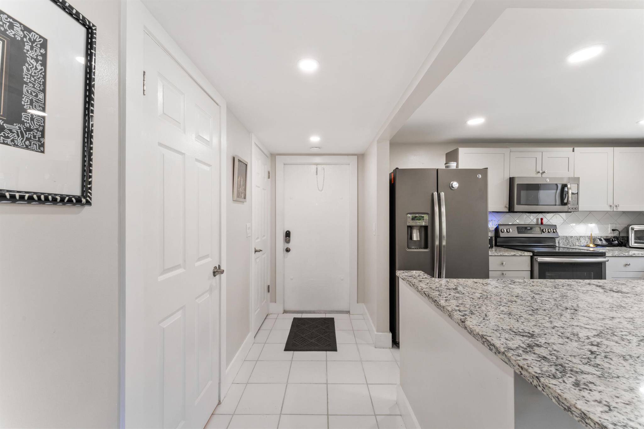 Experience the best of South Florida living in this first-floor condo corner unit with private beach access, ideal for kayaking, paddle boarding, or simply soaking in the breathtaking Intracoastal views.This home features 2 bedrooms, 2.5 bathrooms, and comes fully furnished with high-end designer pieces. Enjoy peace of mind with impact windows and sliding doors, plus the convenience of in-unit laundry. The open-concept kitchen and living room create the perfect space for entertaining family and friends.Located just 5 minutes from I-95, you'll have quick access to Palm Beach, Delray, and surrounding hotspots. The gated community offers resort-style amenities including a pool, tennis courts, sauna, fishing pier, and more.Truly a move-in-ready piece of paradise!