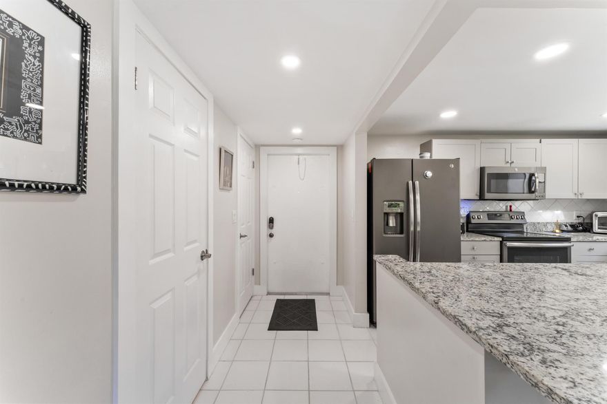 Experience the best of South Florida living in this first-floor condo corner unit with private beach access, ideal for kayaking, paddle boarding, or simply soaking in the breathtaking Intracoastal views.This home features 2 bedrooms, 2.5 bathrooms, and comes fully furnished with high-end designer pieces. Enjoy peace of mind with impact windows and sliding doors, plus the convenience of in-unit laundry. The open-concept kitchen and living room create the perfect space for entertaining family and friends.Located just 5 minutes from I-95, you'll have quick access to Palm Beach, Delray, and surrounding hotspots. The gated community offers resort-style amenities including a pool, tennis courts, sauna, fishing pier, and more.Truly a move-in-ready piece of paradise!