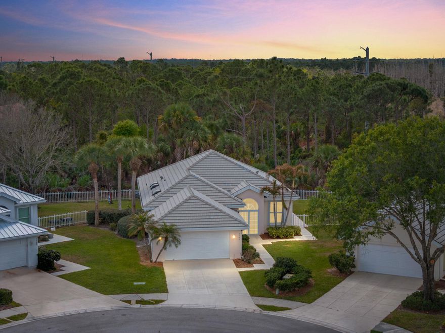 Nestled on an oversized lot within the gated community of The Preserve in the heart of Hobe Sound, this beautifully maintained single-family pool home offers privacy, comfort & move-in ready ease. Backing to a lush natural preserve with no rear neighbors, the fully fenced backyard creates a peaceful setting for outdoor living. The heated pool is perfectly positioned for both entertaining & quiet evenings at home. Inside, new flooring flows throughout the main living areas while plantation shutters add warmth & timeless character.

The spacious primary suite feels like a true retreat, complemented by a thoughtful split-bedroom layout that provides flexibility for guests or family. 
A 2016 concrete tile roof, accordion shutters throughout & meticulous upkeep reflect pride of ownership.