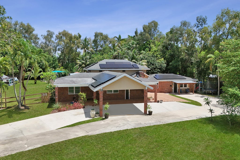 Photo of 10951 SW 58th Court, Davie, FL 33328 (MLS # B26055967)