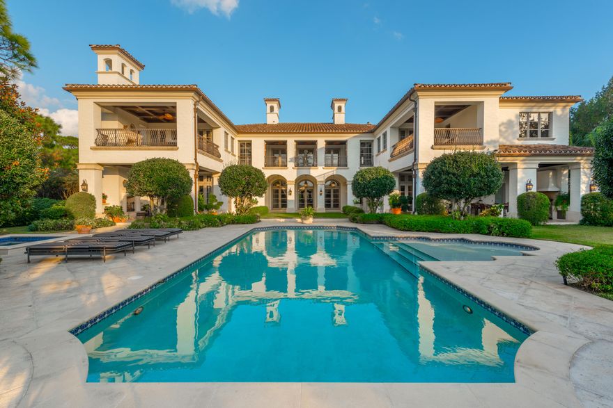 Worthy of the Spring Cover of Dupont Registry Fine Homes Gallery and also featured on CBS Mansions of the Week, this Tuscan inspired estate in the world renowned Bears Club is beautiful. 12,555 Sq Ft under air, this architectural masterpiece boasts 6 bedrooms and 7.5 baths including a 2200 sq ft elegant Master Suite Oasis. The oversized Master Bath with its imported marble offers a hydrotherapy tub, steam shower and teak sauna. The expansive chef's kitchen includes Wolf, Sub Zero and Miele appliances as well as a Butler's Pantry that will store the finest of wines. Groin vaults and venetian plaster enhance the elegant interiors to showcase your art. The first floor offers a second Master Suite. The luxurious craftsmanship welcomes you into the hand selected wood paneled Library, with it's equipped bar and Media Room that seats 12.  The expansive summer kitchen is perfect to entertain family and guests.  Multiple outdoor fireplaces to enjoy on cool South Florida nights.  191 Bears Club is a true treasure just a Chip Shot away from the 5th and 3rd holes of the Jack Nicklaus designed Championship Course.